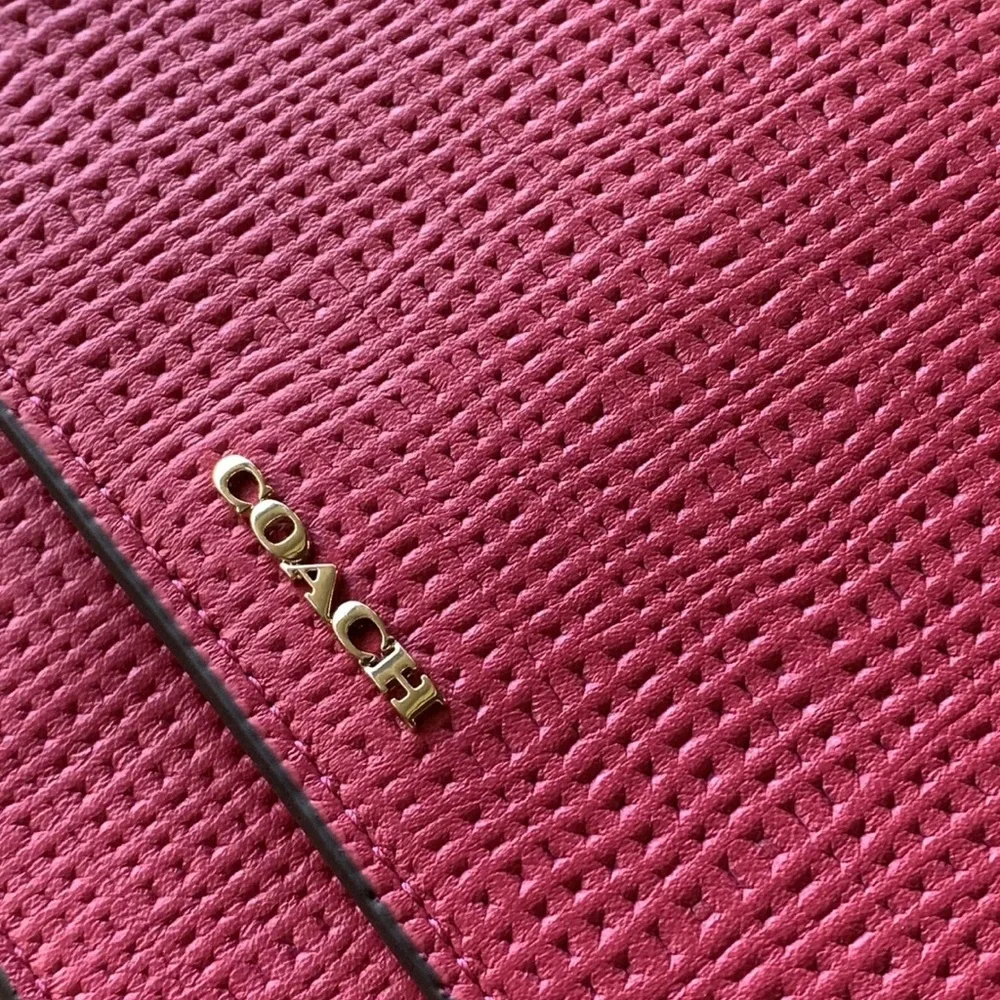 Coach details embossed